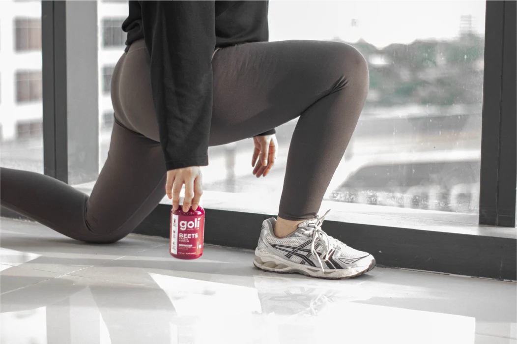Goli gummy bottles lined up by wellness goal